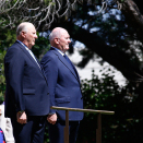 King Harald and Governor-General Peter John Cosgrove listen to the national anthems during the welcoming ceremony in Canberra. Photo: David Gray, Reuters / NTB scanpix